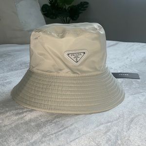 Bone color PRADA nylon bucket hat